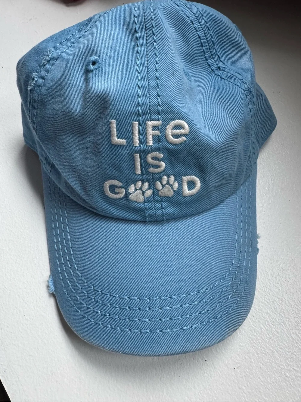 light blue Life is Good Sunwashed Chill Cap white embroidered